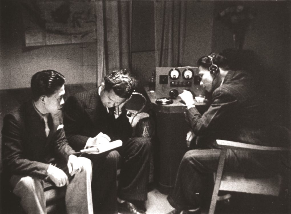 A scene from the 1946 Joris Ivens film Indonesia Calling  showing Indonesian seamen listening to a short-wave radio for news of Indonesia’s declaration of independence. 
